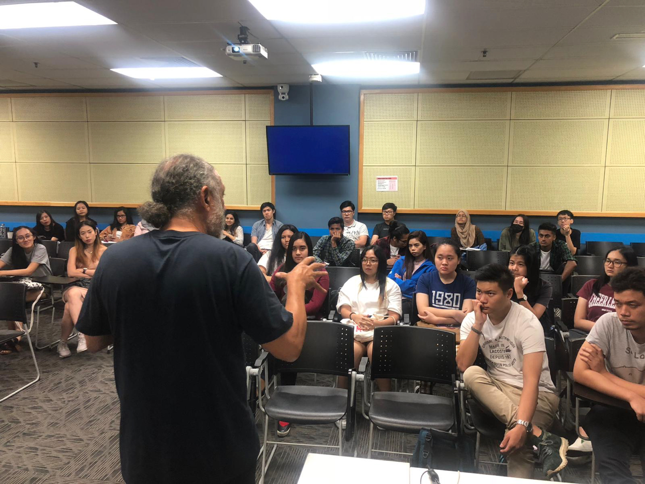 Derek Burrows gives a workshop to a college class