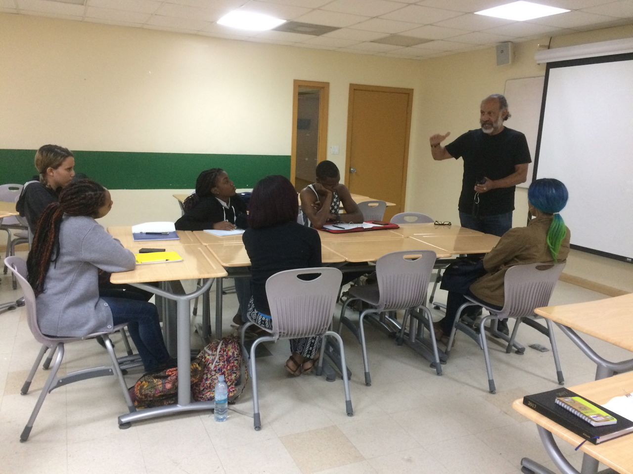 Derek Burrows gives a workshop to a small group of students